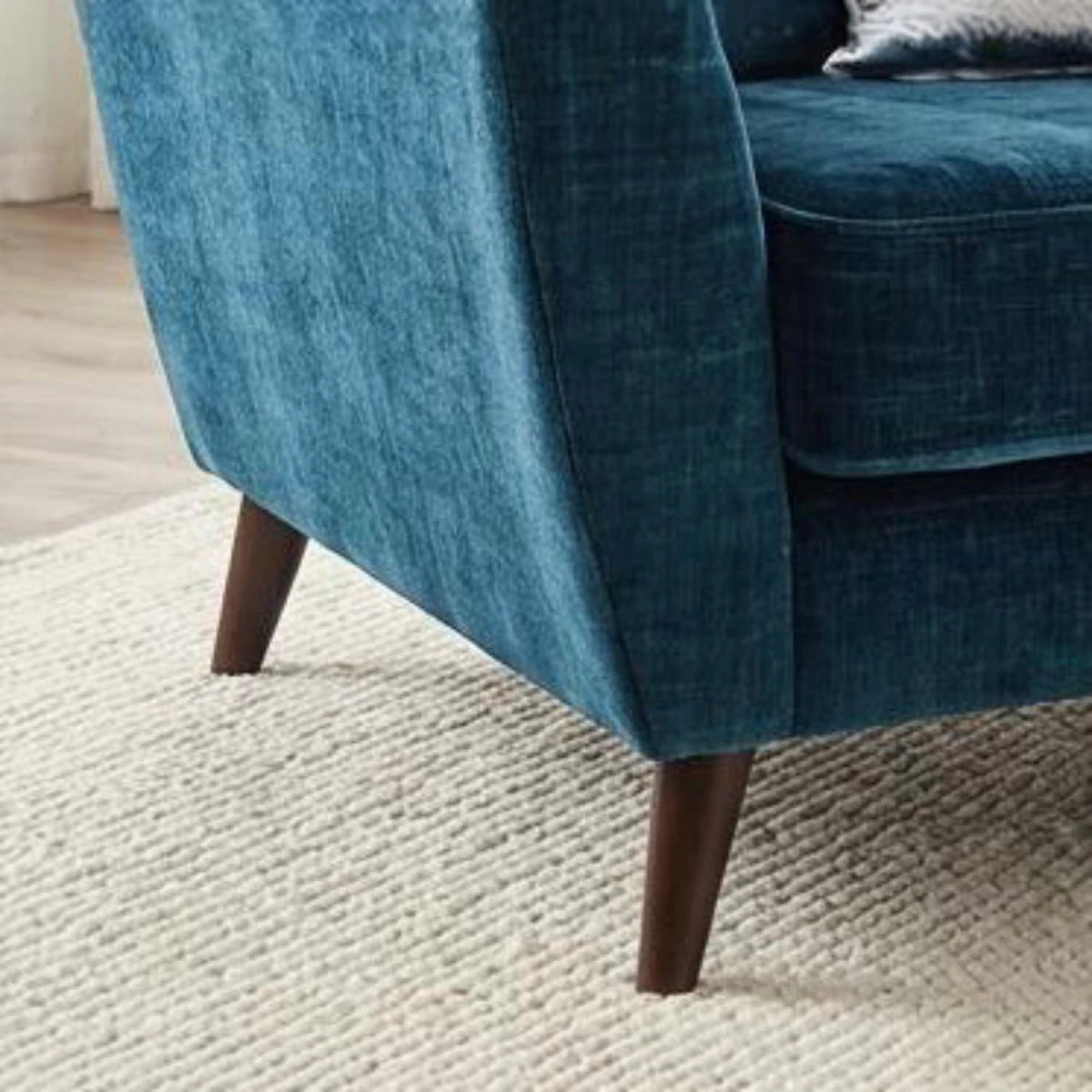 Traditional sofa legs with smooth wood finish and durability.