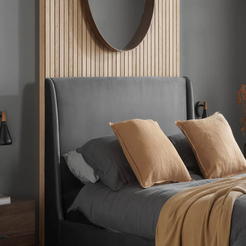 Contemporary plush velvet bed with soft fabric finish.