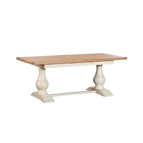 French Country oak dining table with white double pedestal base