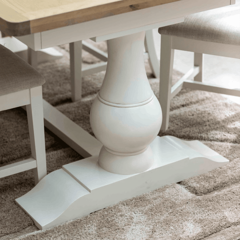 Base close up of Salford oak and white dining table with double pedestal base