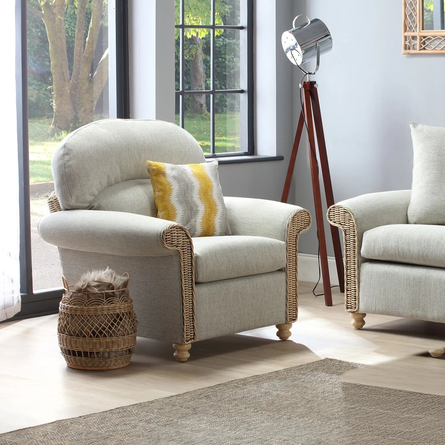 Desser Samford Rattan Armchair in Pebble Fabric. Samford Collection also available in 3 Seater, 2 Seater, Swivel Chair, Footstool and Coffee Table and Lamp Table to give your conservatory modern elegance. Choose from a variety of fabrics - Lifestyle Image 