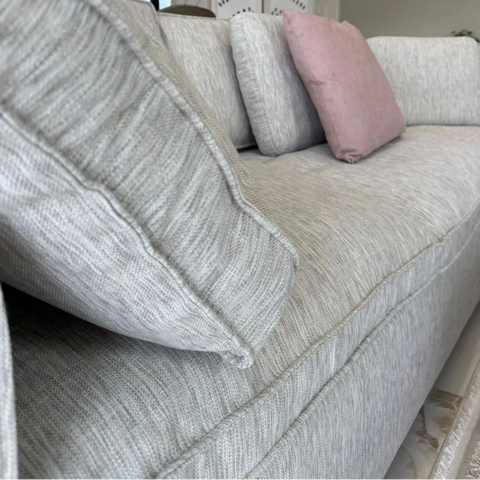 Linen weave fabric corner sofa with soft breathable texture.