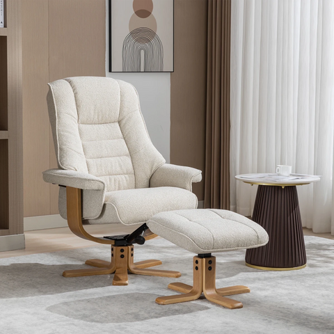 A cream-colored upholstered swivel armchair with a matching ottoman, shown in a modern living room setting with a side table, curtains, and a rug.