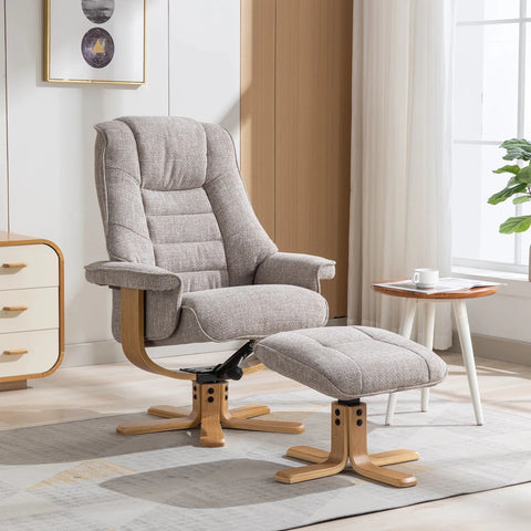A Oat meal upholstered recliner chair with a matching ottoman, both with natural wood bases, shown in a bright, modern living room setting.