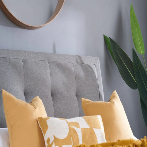 Luxurious tufted headboard with classic design.