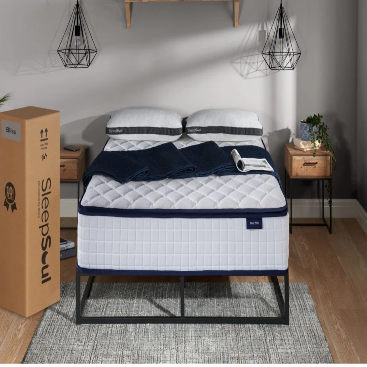 Pillow top mattress with memory foam and pocket springs.