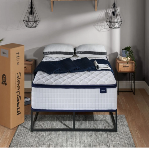 Pillow top mattress with memory foam and pocket springs.