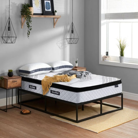 Hybrid mattress with pocket springs and foam layers.