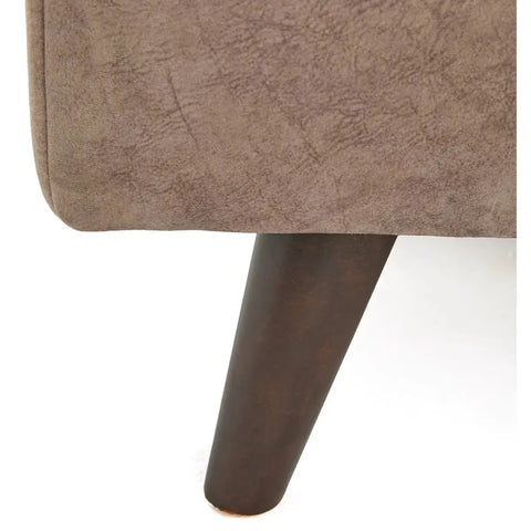 Close-up of Soho Gemini footstool foot