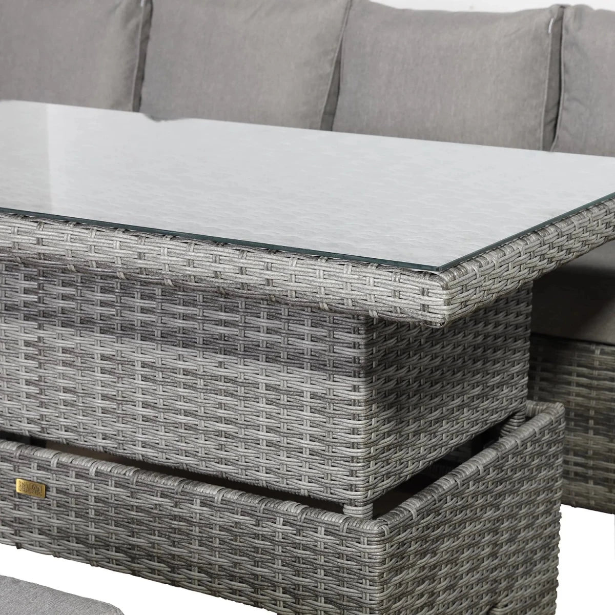 Adjustable rising table converting from coffee to dining height.
