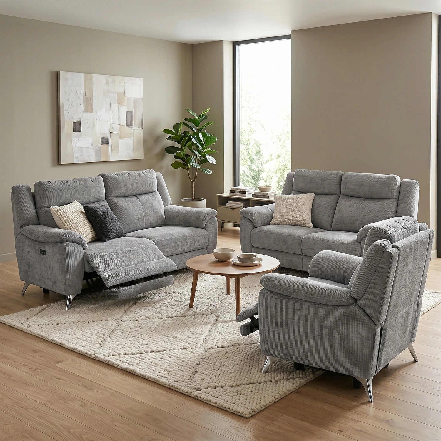 A 3-piece grey fabric Power reclining Modern Sofa Upholstered in Chenille Fabric , available as 3 Seater, 2 Seater or Arm Chair