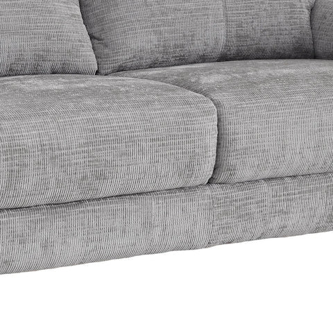Close-up of a light gray textured fabric sofa cushion with a ribbed corduroy-like weave, showing the seat and back cushions against a white background.
