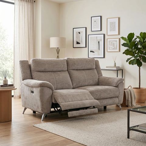 A beige upholstered reclining 3 Seater Sofa 