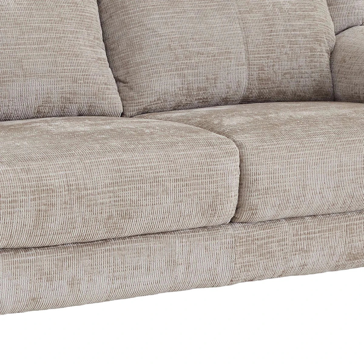 Close-up of a textured light beige upholstered sofa showing the seat cushion, back cushions, and ribbed fabric detail.