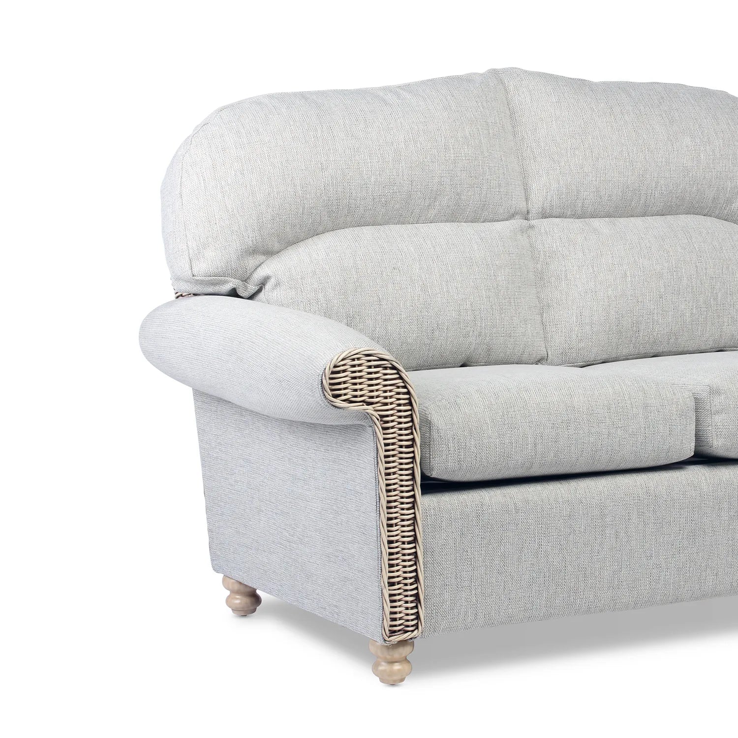 Desser Samford Rattan 3 Seater Sofa in Pebble Fabric. Also available in 2 Seater, Swivel Chair, Swivel Rocker, Armchair and Footstool. Style with matching Coffee Table and Lamp Table. Choose from a variety of fabrics - Close up of Arm wicker detail