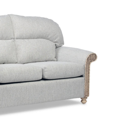 Desser Samford Rattan 3 Seater Sofa in Pebble Fabric. Also available in 2 Seater, Swivel Chair, Swivel Rocker, Armchair and Footstool. Style with matching Coffee Table and Lamp Table. Choose from a variety of fabrics - Close up of 3 Seater - Close Up of Undulated Foot 