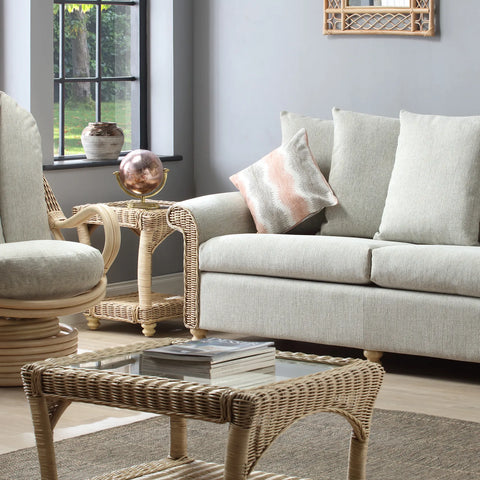 Desser Samford Rattan 3 Seater Sofa with Scatter Cushions in Pebble Fabric. Also available in 2 Seater, Swivel Chair, Swivel Rocker, Armchair and Footstool. Style with matching Coffee Table and Lamp Table. Choose from a variety of fabrics - Sofa with matching furniture 