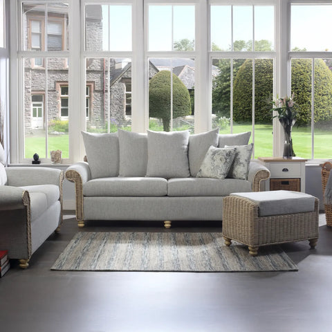Desser Samford Rattan 3 Seater Sofa with Scatter Cushions in Pebble Fabric. Also available in 2 Seater, Swivel Chair, Swivel Rocker, Armchair and Footstool. Style with matching Coffee Table and Lamp Table. Choose from a variety of fabrics - Lifestyle Image 