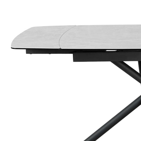 Close up of Sydney white ceramic extending dining table with designer base