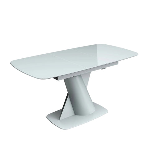 Modern light grey dining table with a unique base design on a white background