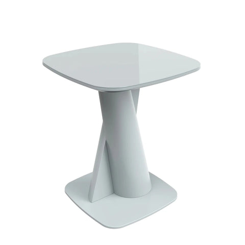 Modern side table with a white glass top and base on a white background