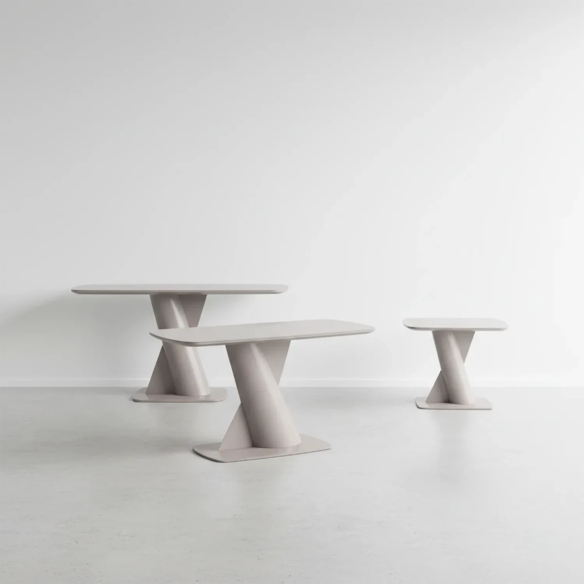 Lorenzano taupe pedestal base coffee table, console table and side table  in a room