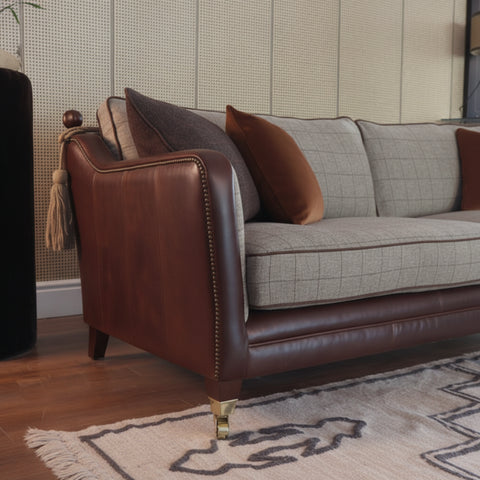 Classic sofa arms with decorative finial detailing.