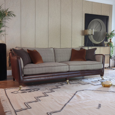 Luxury grand sofa with traditional elegant styling.