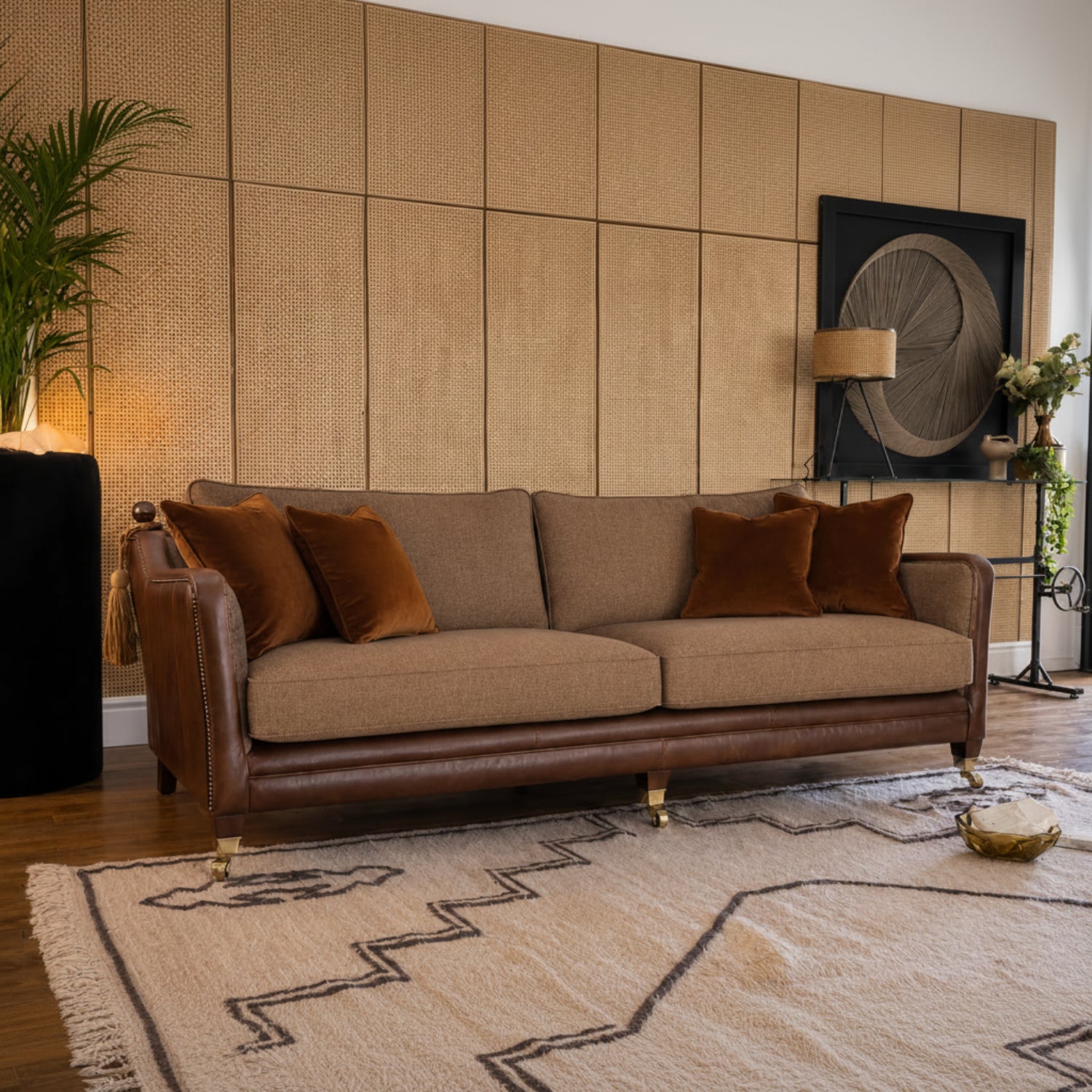 Compact fabric sofa ideal for cosy living spaces.