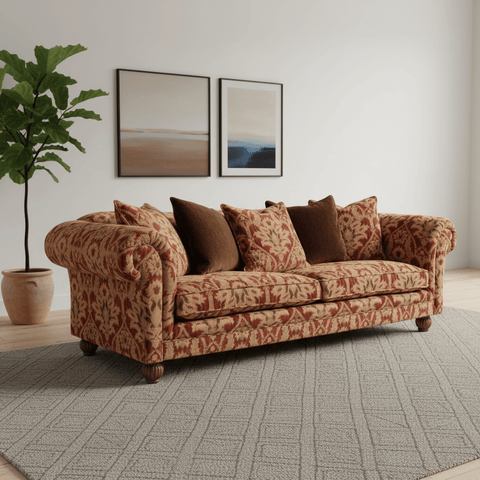 Tetrad Elgar Grand Patterned sofa with decorative pillows in a living room setting.