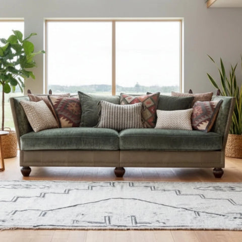 Midi sofa with velvet and leather upholstery and feather cushions