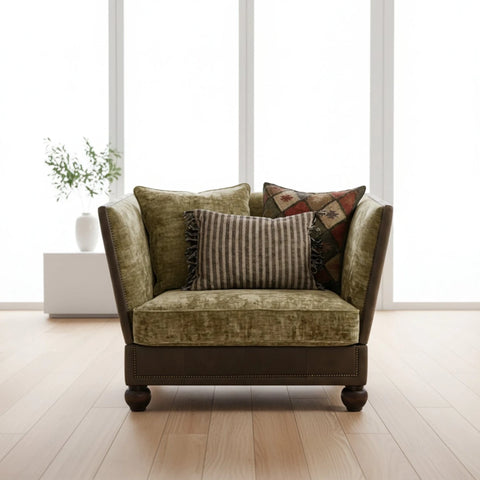 Luxury snuggle chair with heritage inspired detailing.