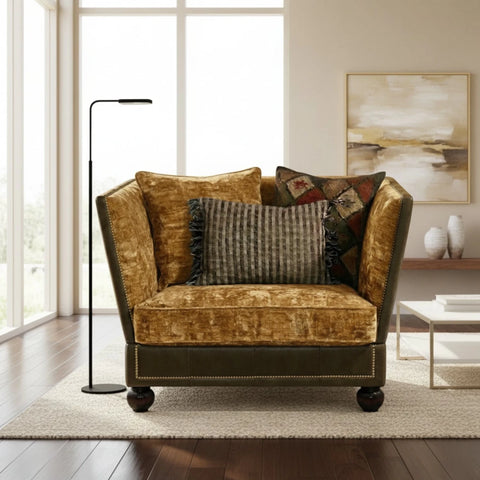 Knole style chair with dropped arms and plush seating comfort.