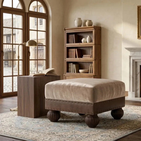 Luxury compact stool with stud detailing and refined design.