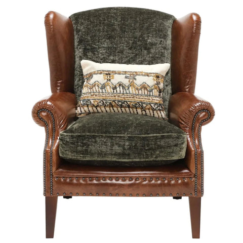 Classic wing chair with premium materials and detailing.