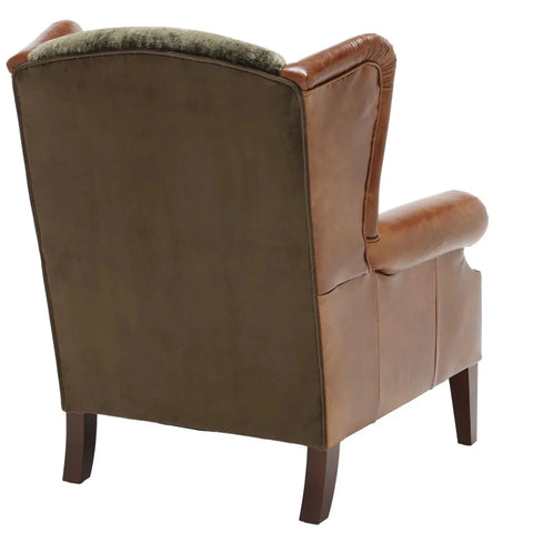 High wingback design providing support and classic style.