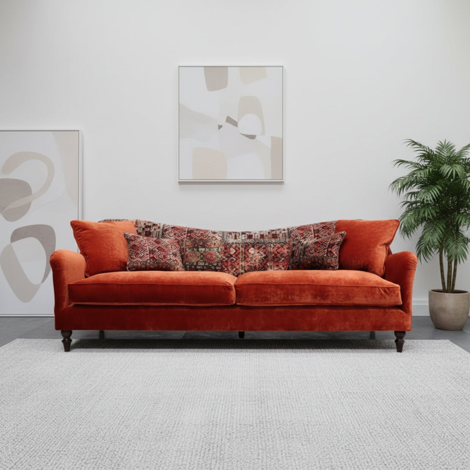 Tiffany Spink velvet grand sofa with elegant curved design.