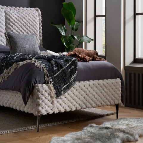 Ultra-soft faux fur upholstery with premium finish.