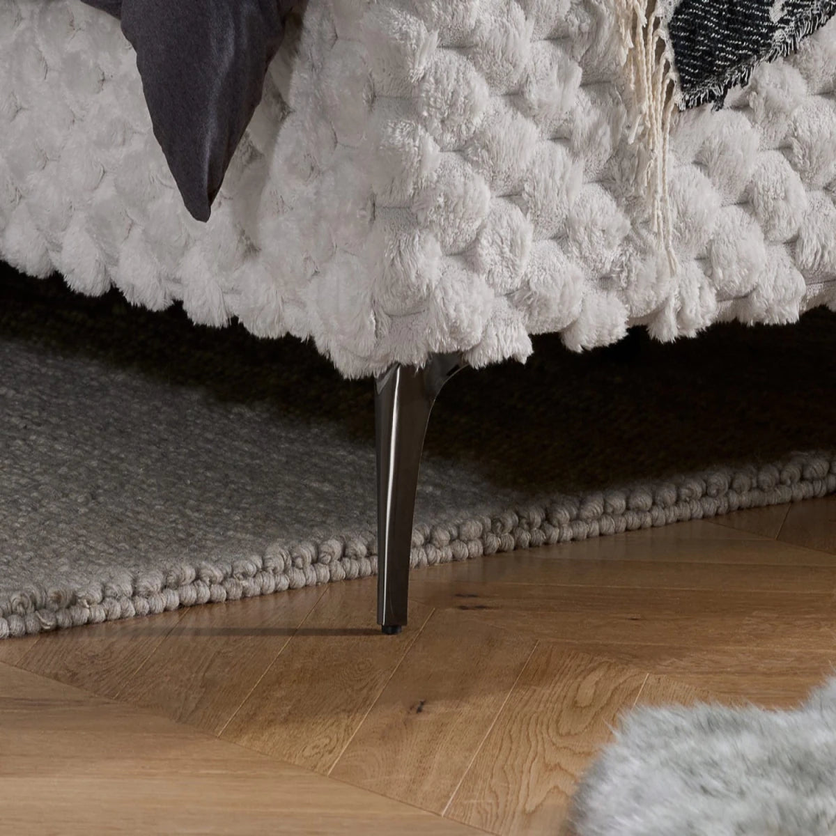 Sturdy bed feet providing strong and stable support.