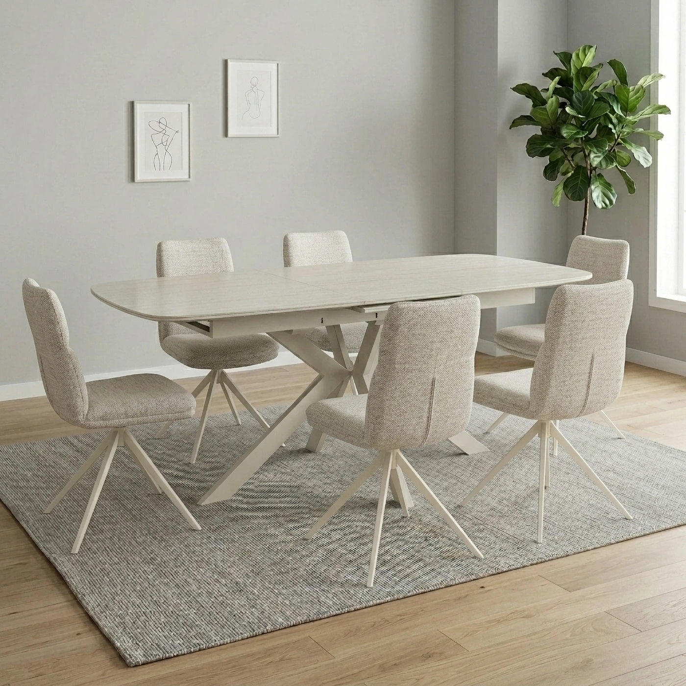 A modern dining set featuring a light wood rectangular table with a central pedestal base and six upholstered dining chairs with light wood legs, arranged on a textured gray rug in a bright room.