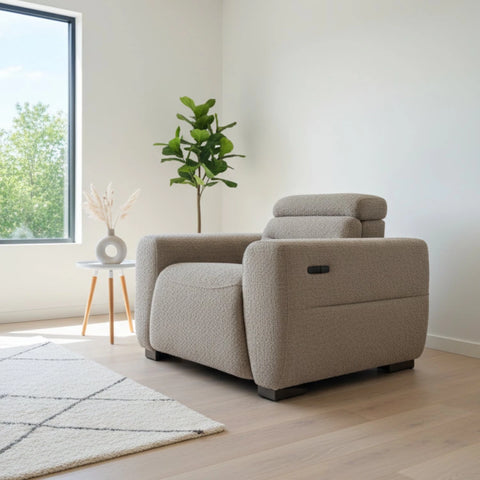 Boucle fabric armchair with soft textured premium finish.