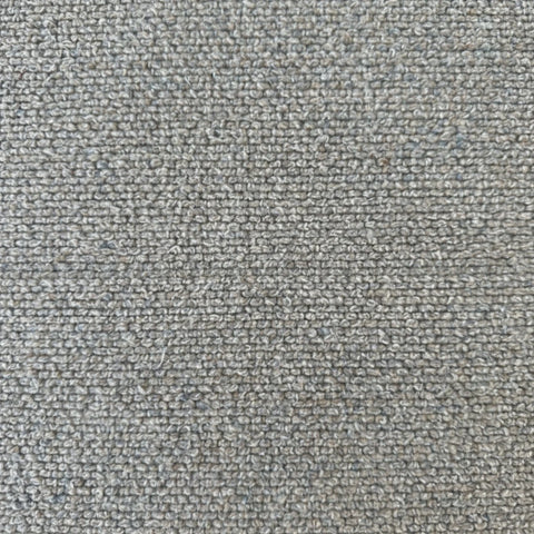 Soft boucle weave upholstery with premium textured finish.