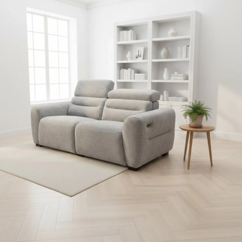 Modern grey 3 seater recliner sofa with clean elegant design.