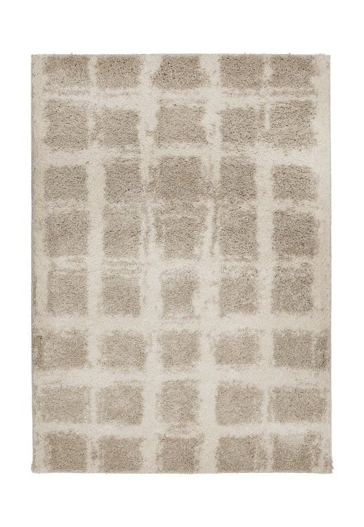 Elegant natural tone rug adding warmth to living space.