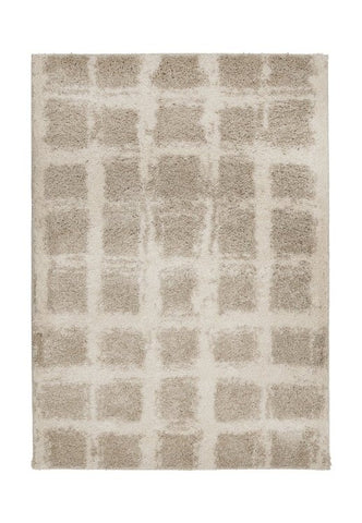 Elegant natural tone rug adding warmth to living space.