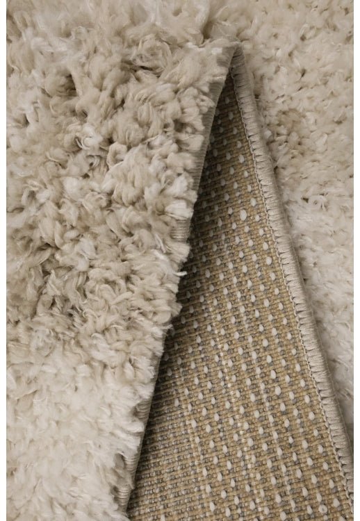 Stylish shaggy rug in natural tones for modern homes.