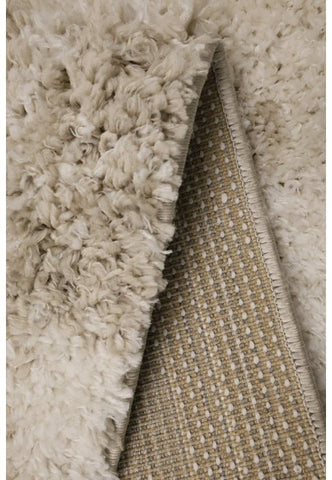 Stylish shaggy rug in natural tones for modern homes.
