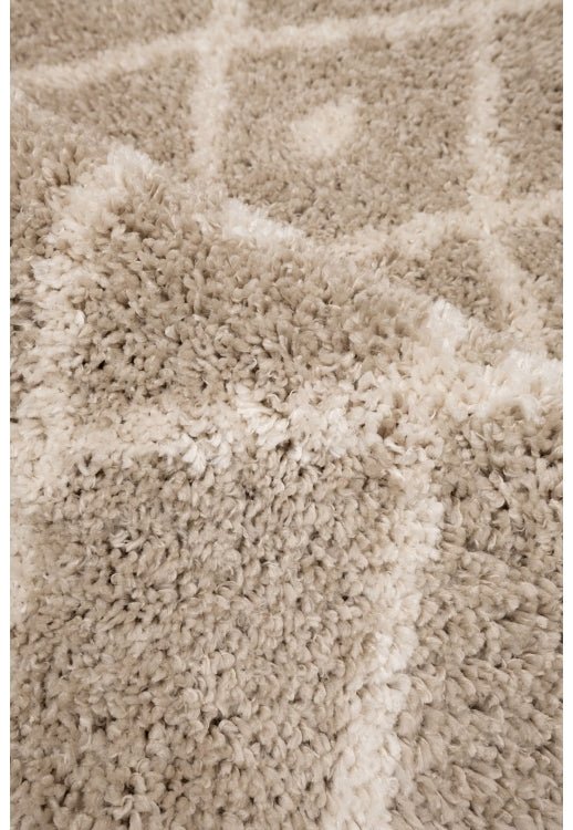 Soft area rug with inviting texture and refined look.