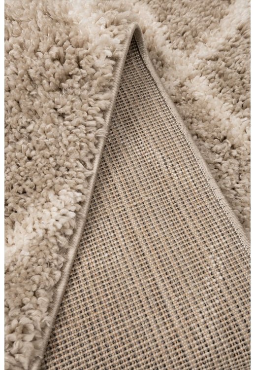 Stylish shaggy rug in natural tones for modern homes.