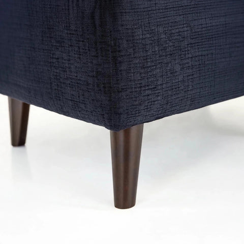 Modern chenille storage footstool with hidden compartment and compact stylish design.